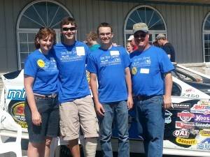 Whether they’re on the farm or at the track, the Richardson family is promoting dairy. Pictured from left to right: Kristi, Jacob, Jason and Jay.