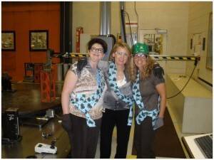 Sally Hollis having fun in the metallurgical lab with two co-workers